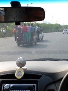 The craziness of how these guys are riding notwithstanding, I was struck by the colors of their clothes. In the US, neither men nor women would wear such bright combinations of colors, but it is a common sight in India, which I loved!